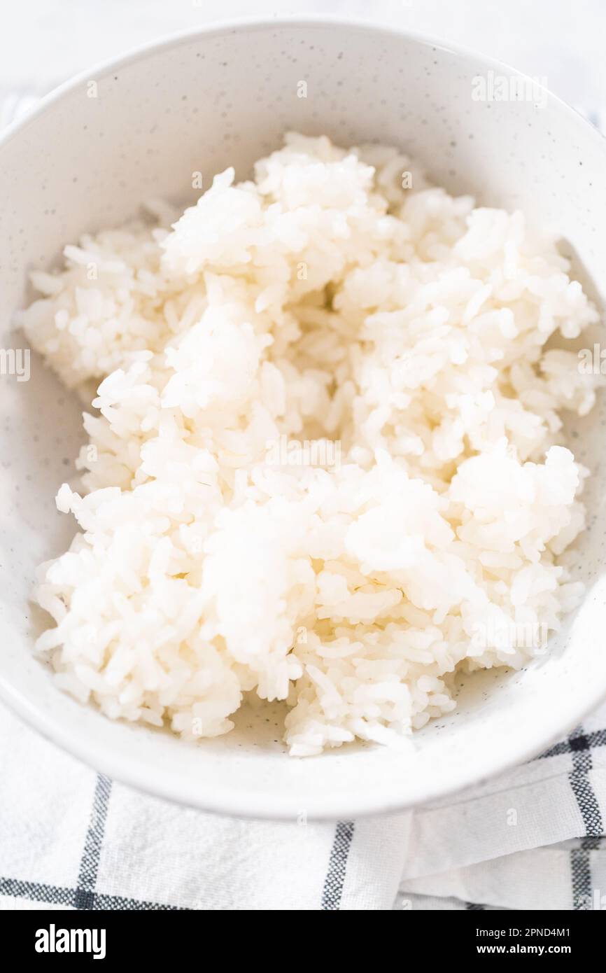 Cuisson du riz Banque D'Images Cuisson du riz Banque D'Images