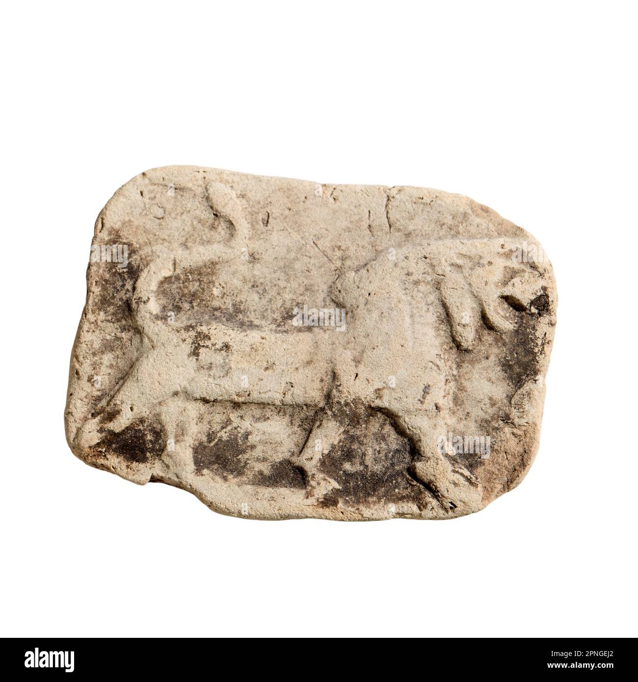 Une plaque en terre cuite représentant un lion rugissant 2e millénaire BCE Banque D'Images