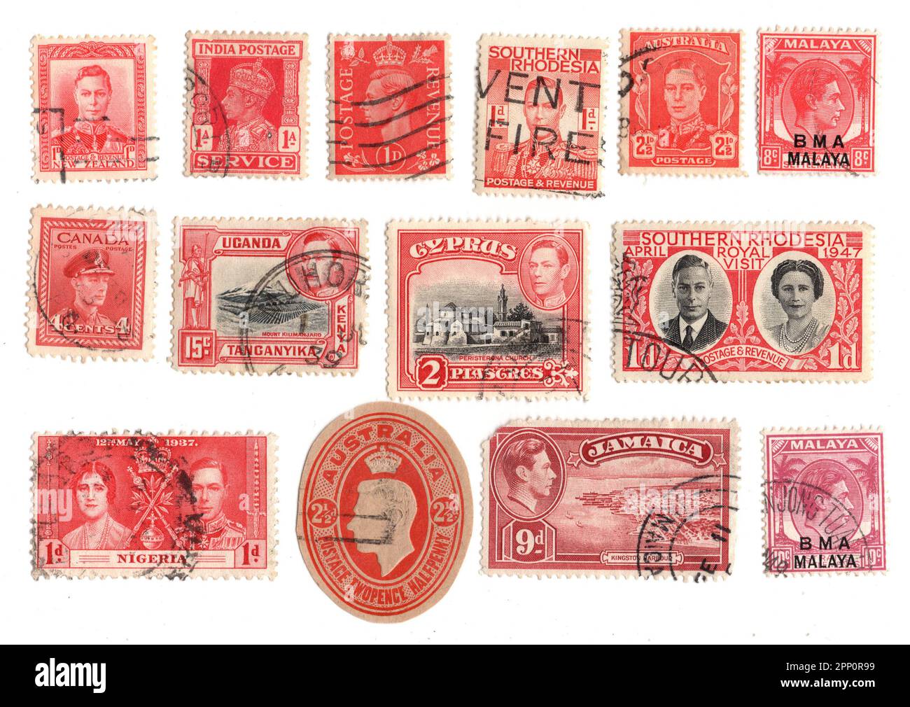 Les timbres-poste du roi George VI du monde entier sont isolés sur fond blanc. Banque D'Images