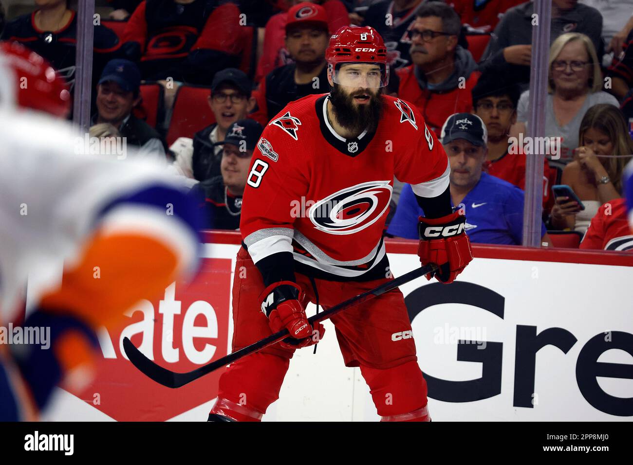 Carolina Hurricanes' Brent Burns (8) watches the puck against the New York Islanders during the second period of Game 2 of an NHL hockey Stanley Cup first-round playoff series in Raleigh, N.C., Wednesday, April 19, 2023. (AP Photo/Karl B DeBlaker) Banque D'Images
