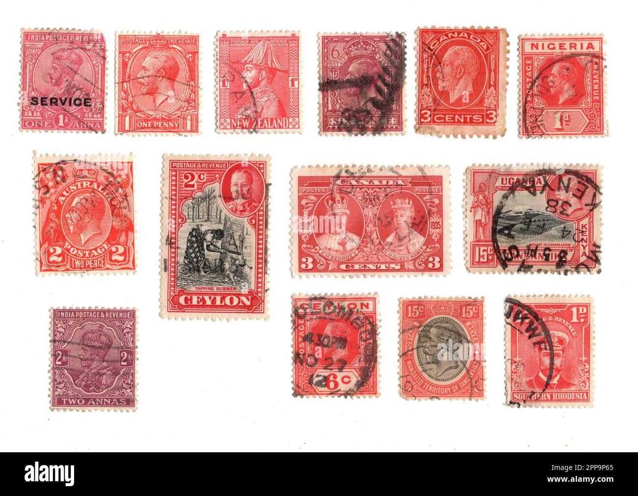 Les timbres-poste du roi George V du monde entier sont isolés sur fond blanc. Banque D'Images