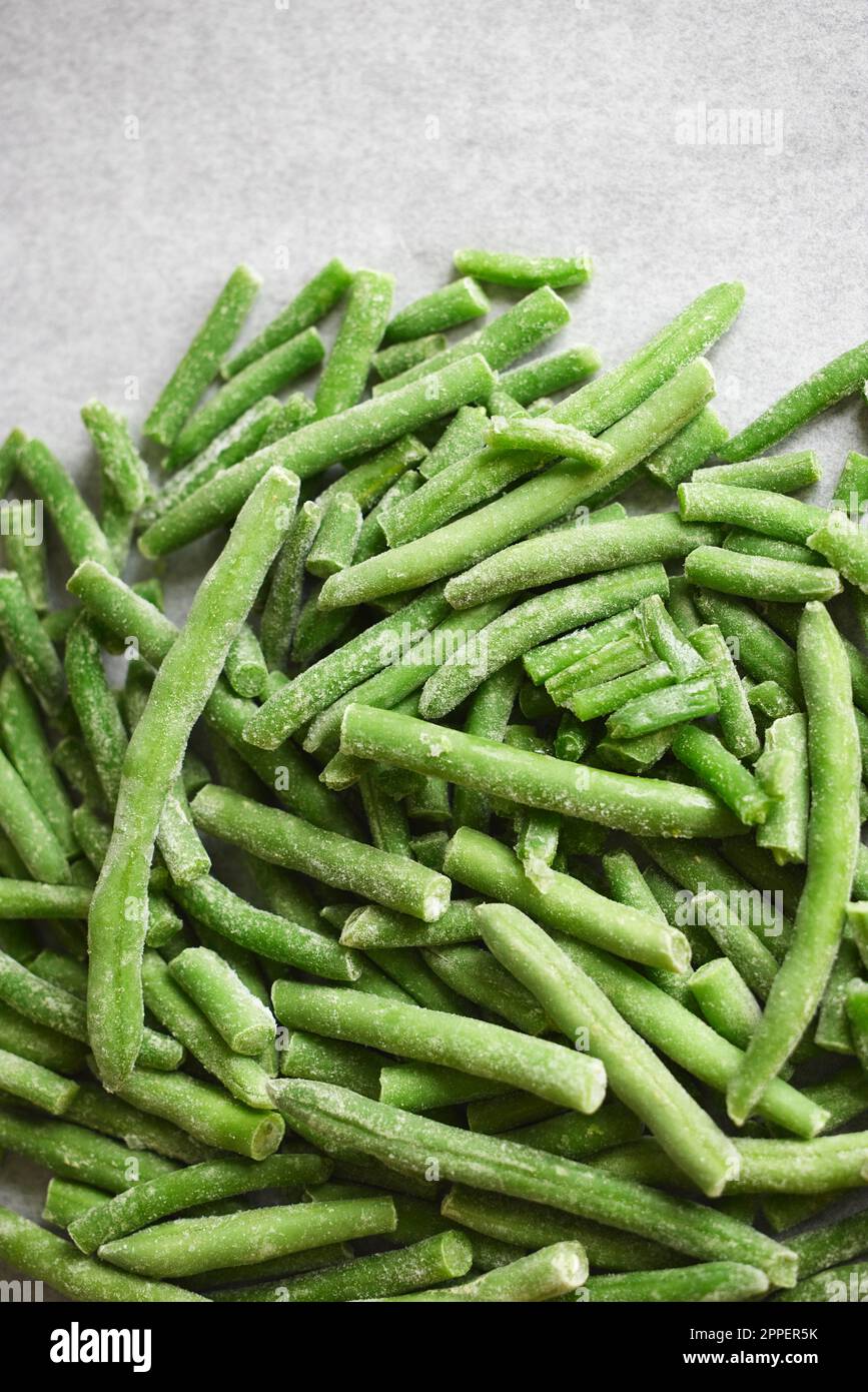 Tas de haricots verts congelés Photo Stock - Alamy