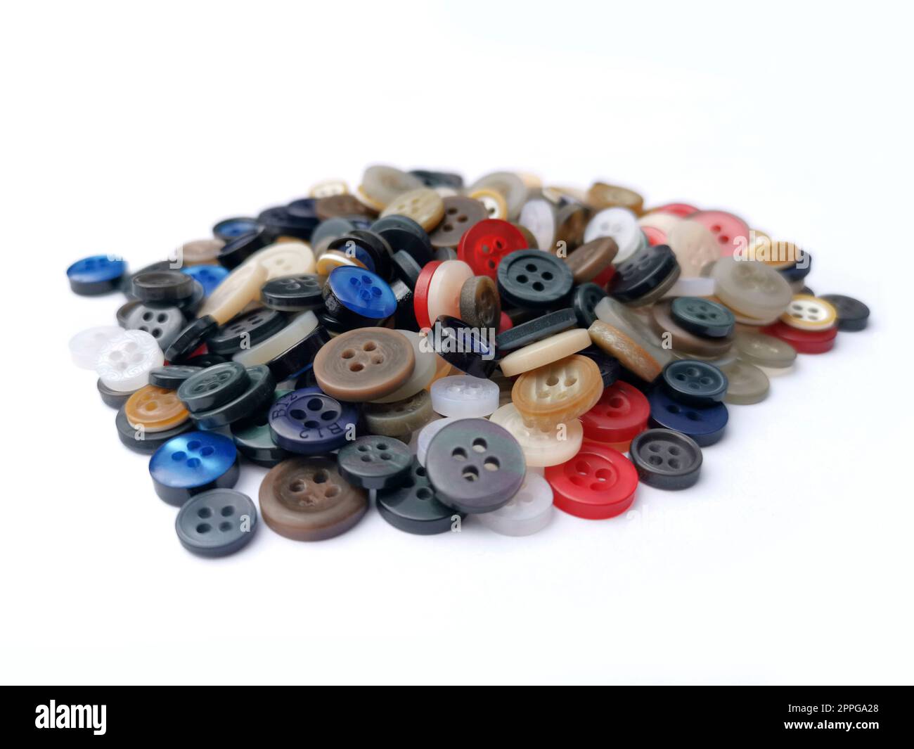 boutons de vêtements sur fond blanc Banque D'Images