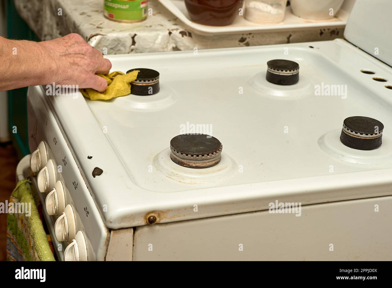 nettoyage à l'eau du poêle à gaz Banque D'Images