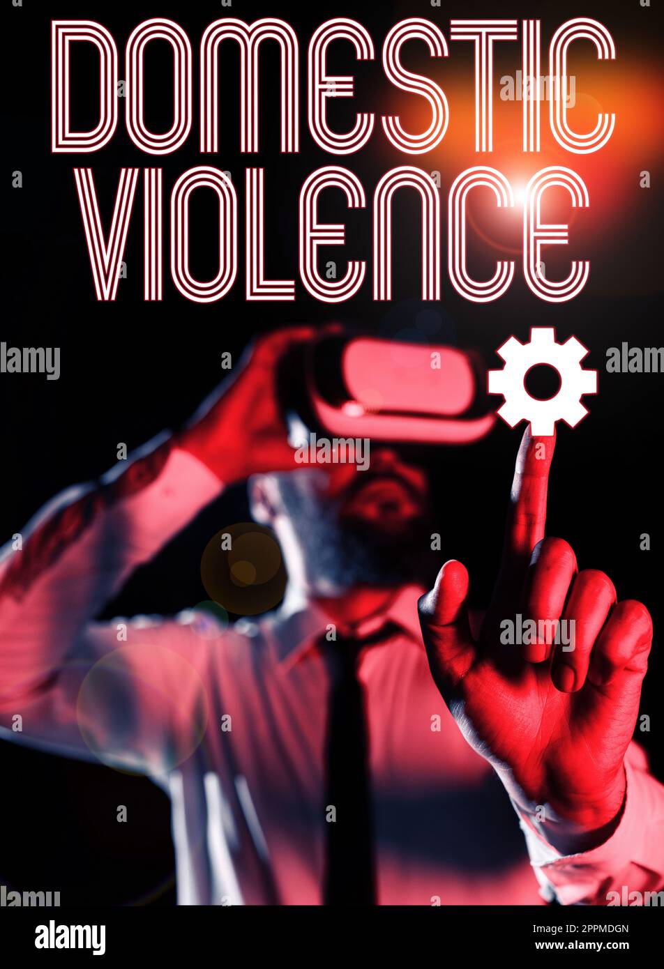 Signe d'écriture à la main violence domestique. Mot pour comportement violent ou abusif dirigé par une famille ou un membre du ménage Banque D'Images