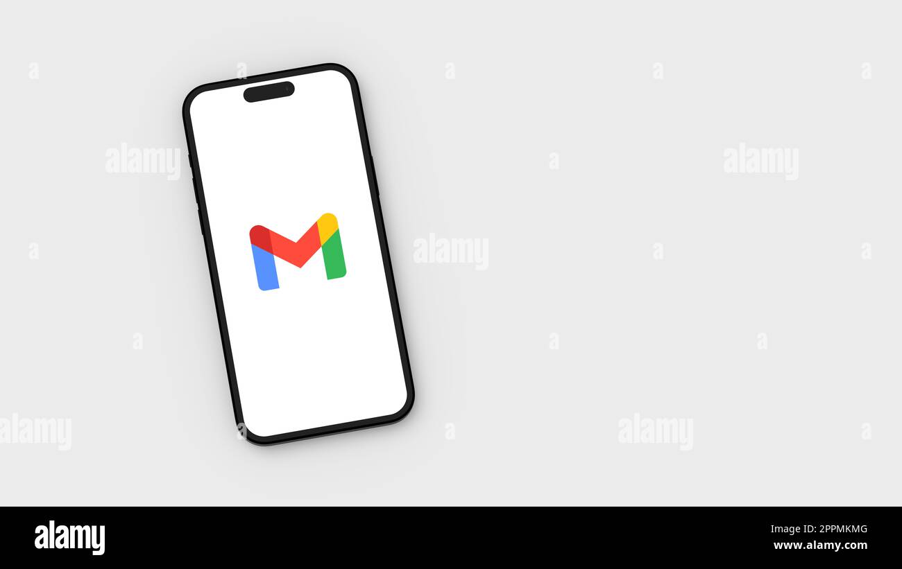 Logo Gmail sur l'écran du téléphone portable sur fond gris avec espace de copie Banque D'Images