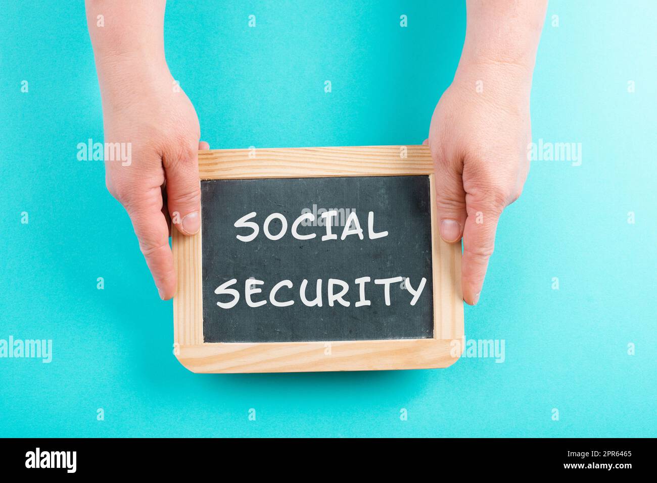 Les mots sécurité sociale sont debout sur un tableau noir Banque D'Images