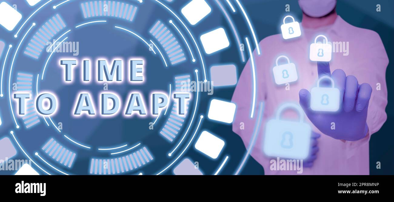 Inspiration montrant le temps de s'adapter. Le moment de l'idée d'entreprise pour s'adapter aux changements embrassez l'innovation Homme pointant les gants Smart Internet Computer Lock System sur les mains. Banque D'Images