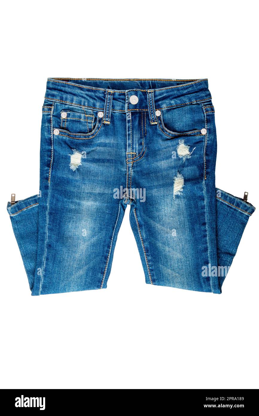 Filles Jean isolé. Pantalon féminin élégant et tendance avec Jean bleu, isolé sur fond blanc. Pantalon en denim tendance pour enfants. Banque D'Images