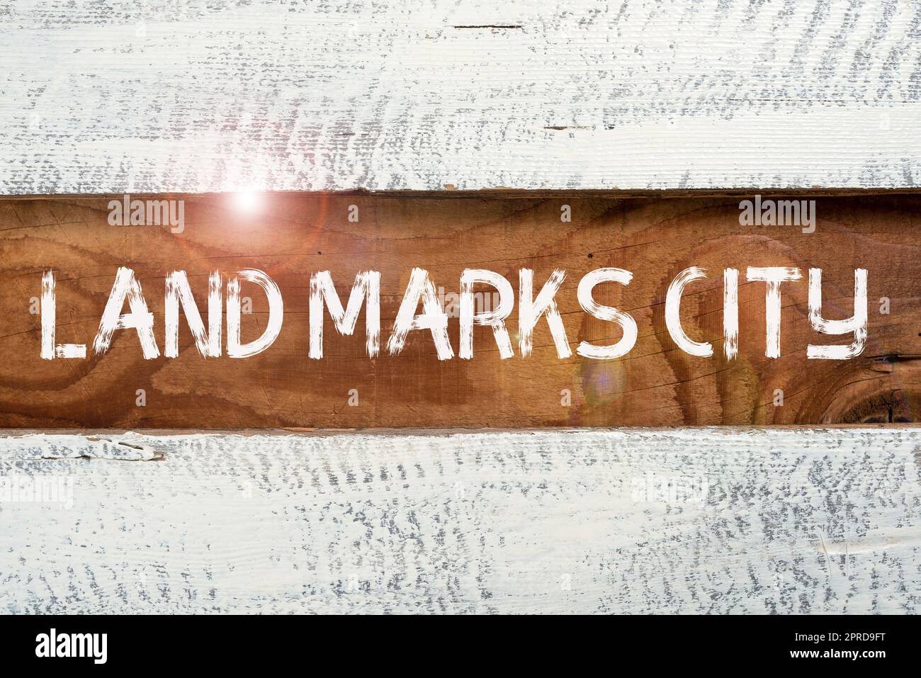 Inspiration montrant le signe Land Marks City. Approche d'affaires lieux importants d'architecture dans les villes pour visiter des informations importantes écrites sur morceau de bois sur plancher. Banque D'Images