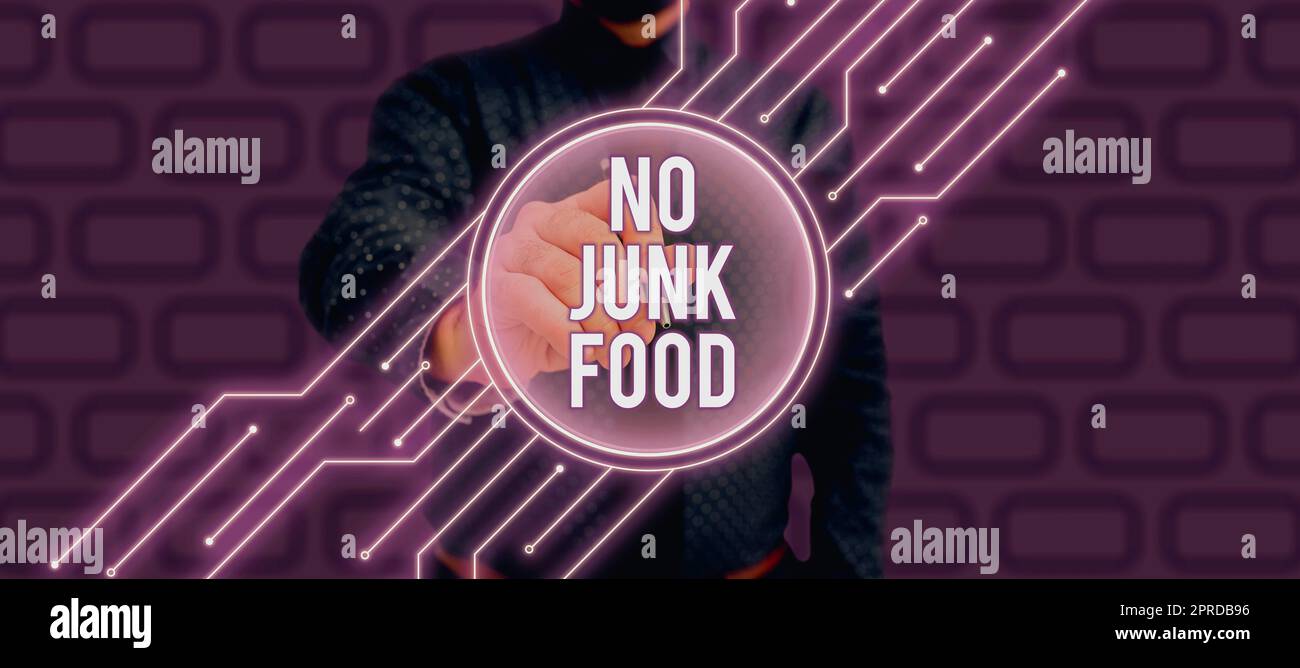 Écriture affichant le texte No Junk Food. Idée d'affaires cesser de manger des choses malsaines aller sur un régime de renoncer burgers frites homme d'affaires en costume tenant bloc-notes symbolisant un travail d'équipe réussi. Banque D'Images