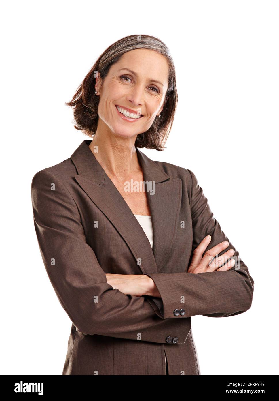 Son sourire met tout le monde à l'aise. Portrait court d'une belle femme mûre en tenue d'affaires posé en studio. Banque D'Images