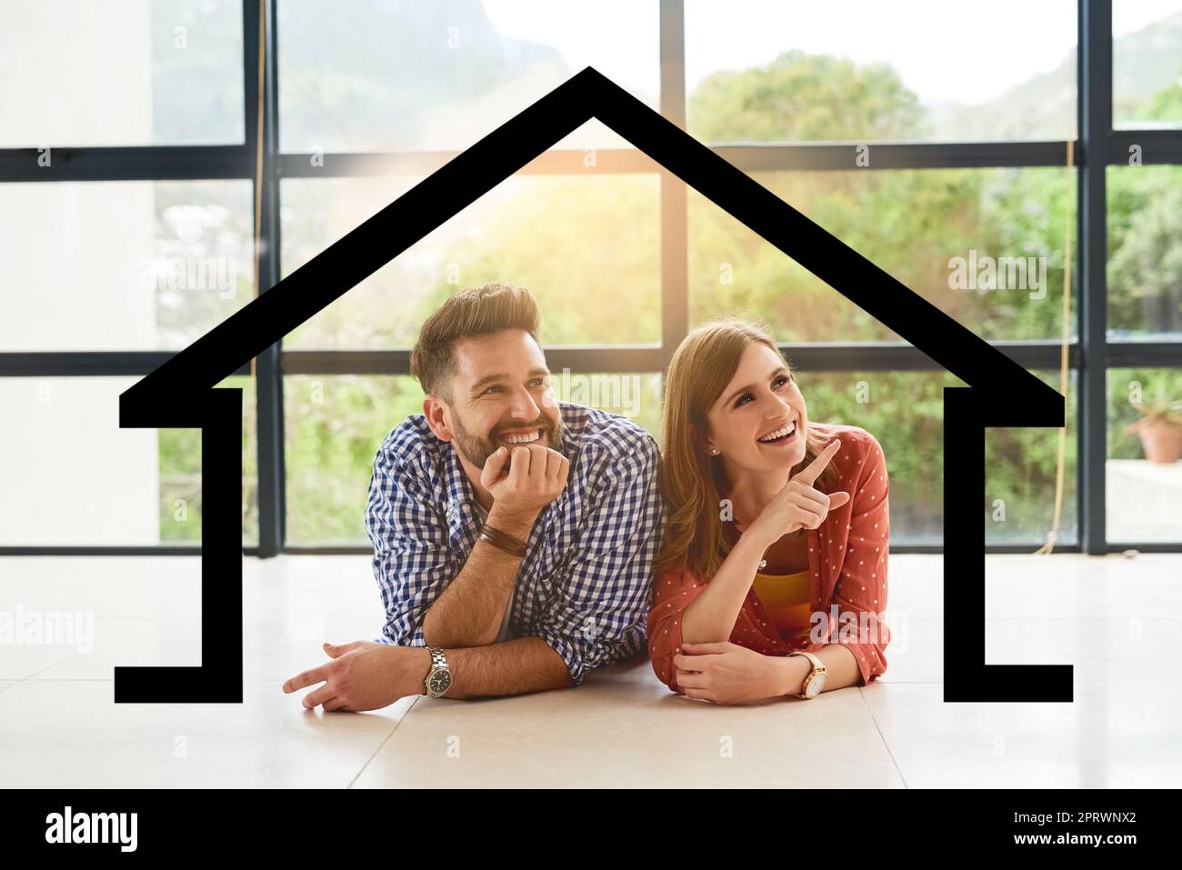 Rêver de nouveaux débuts. un jeune couple rêve d'une nouvelle maison Banque D'Images