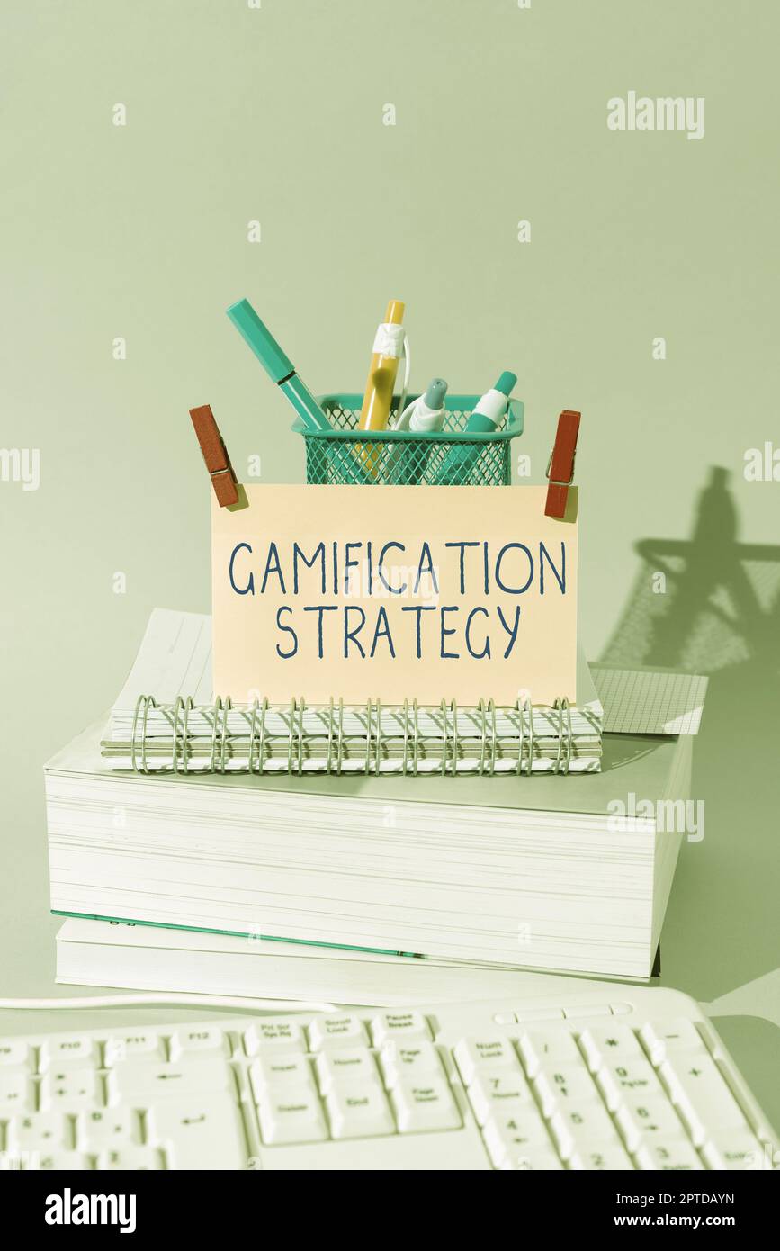 Affiche de texte montrant la stratégie de gamification, l'utilisation des idées d'affaires récompenses pour la motivation intégrer la mécanique de jeu Banque D'Images