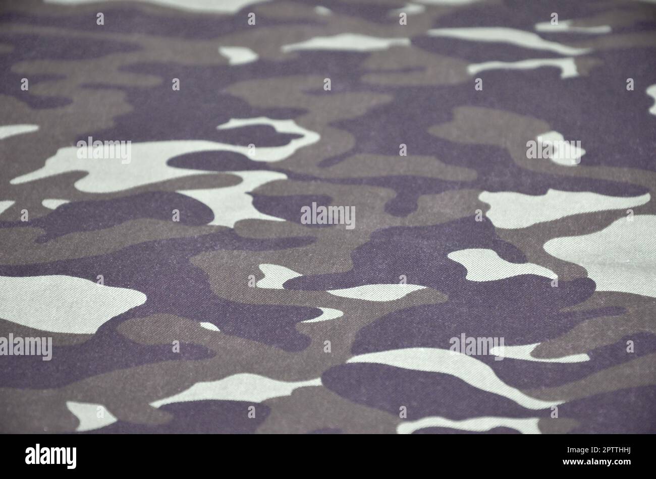 La texture de tissu avec un camouflage peint en couleurs du marais. Image de fond de l'armée. Textile pattern de tissu camouflage militaire Banque D'Images