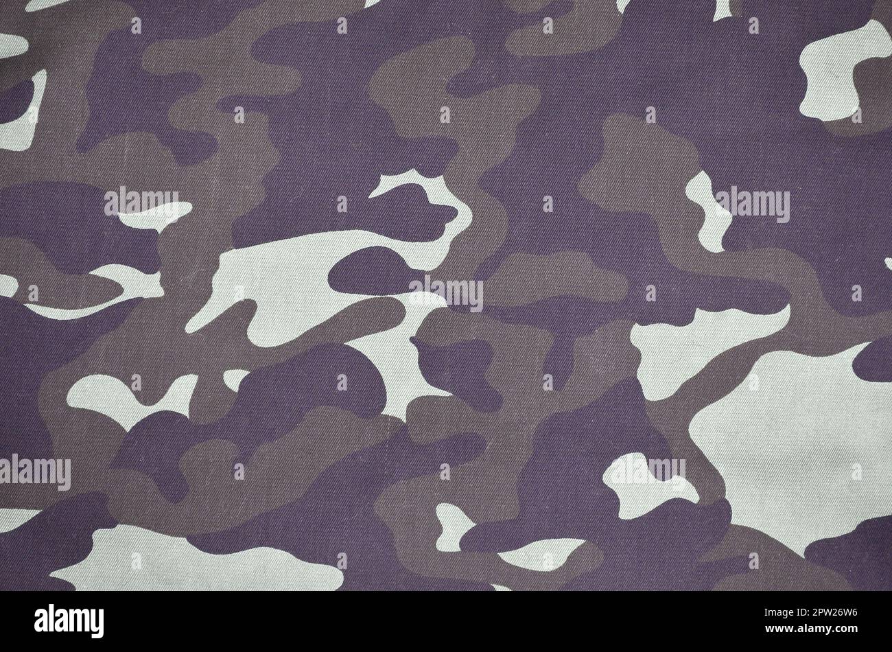 La texture de tissu avec un camouflage peint en couleurs du marais. Image de fond de l'armée. Textile pattern de tissu camouflage militaire Banque D'Images