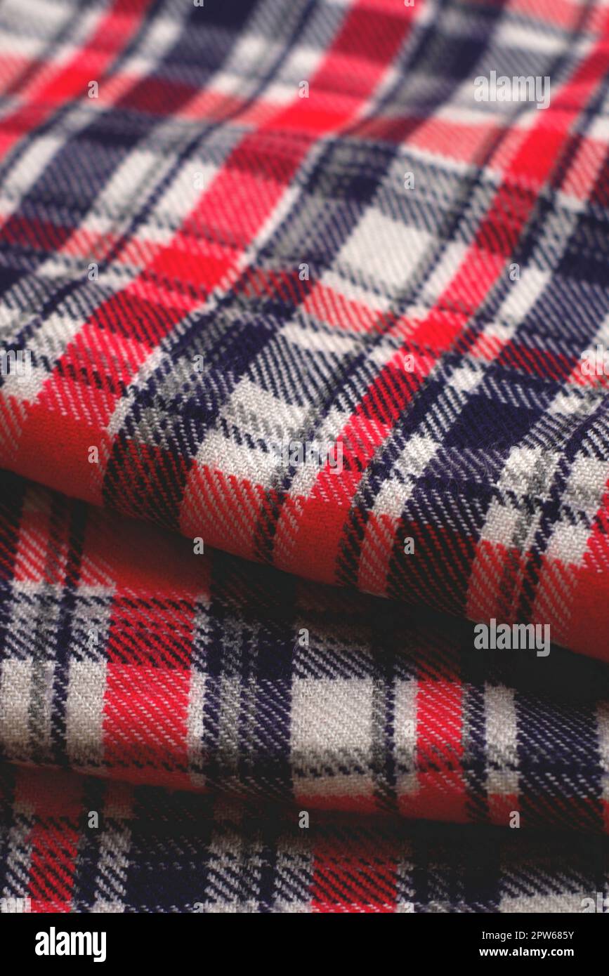 Gros plan d'une rouge, bleu et blanc en tissu à motifs tartan. Banque D'Images