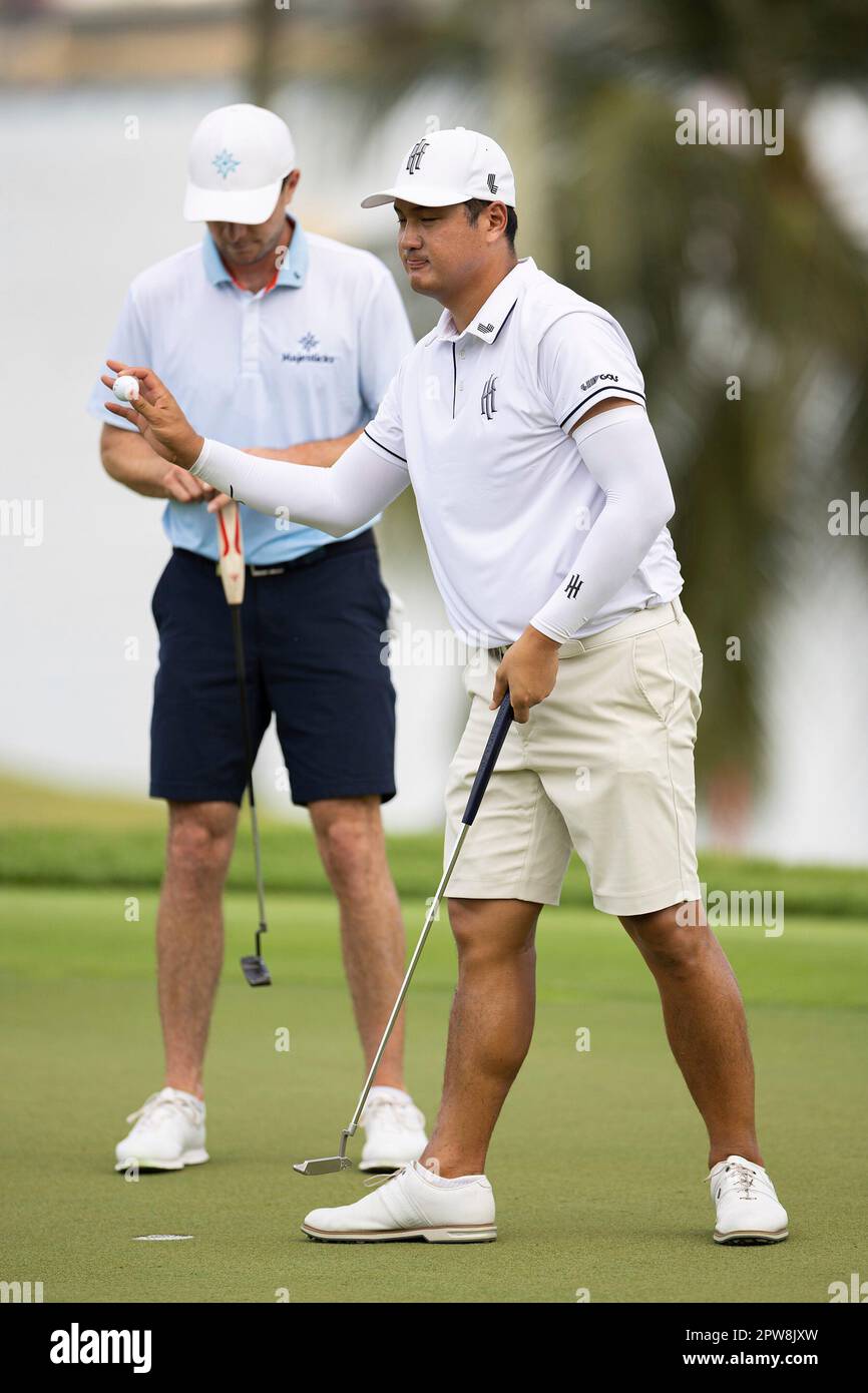 Sihwan Kim of Iron Heads GC reacts on the 15th green during the second