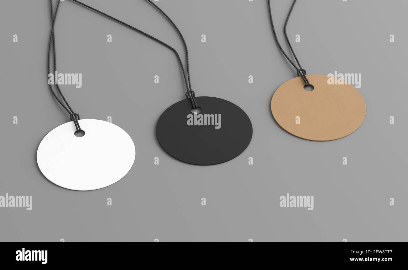 Maquette d'étiquettes rondes blanches, en carton, noires sur fond gris. Vue latérale Banque D'Images
