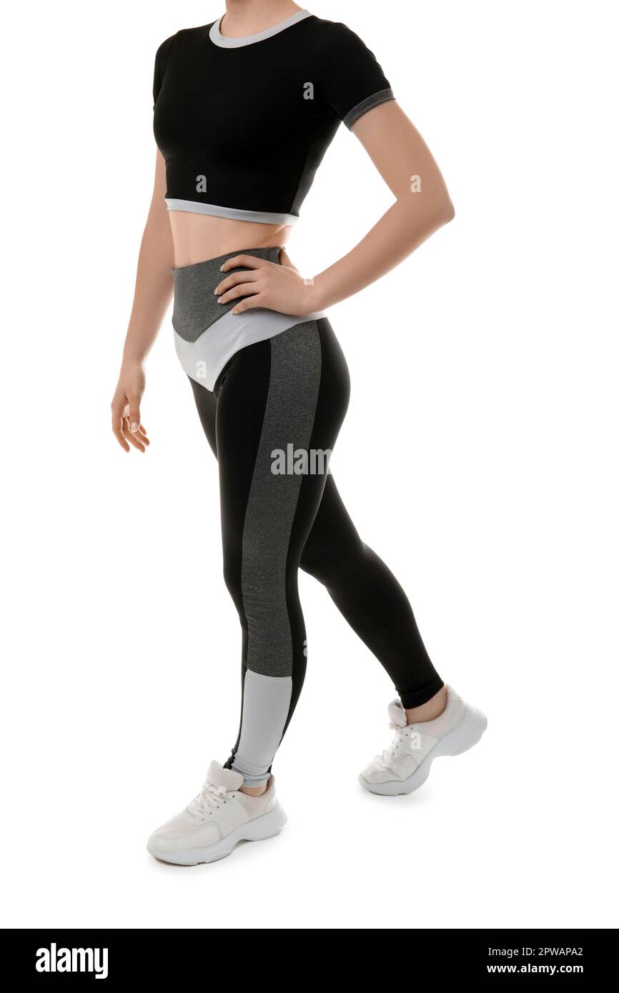 Jeune femme sportive avec leggings sur fond blanc Banque D'Images