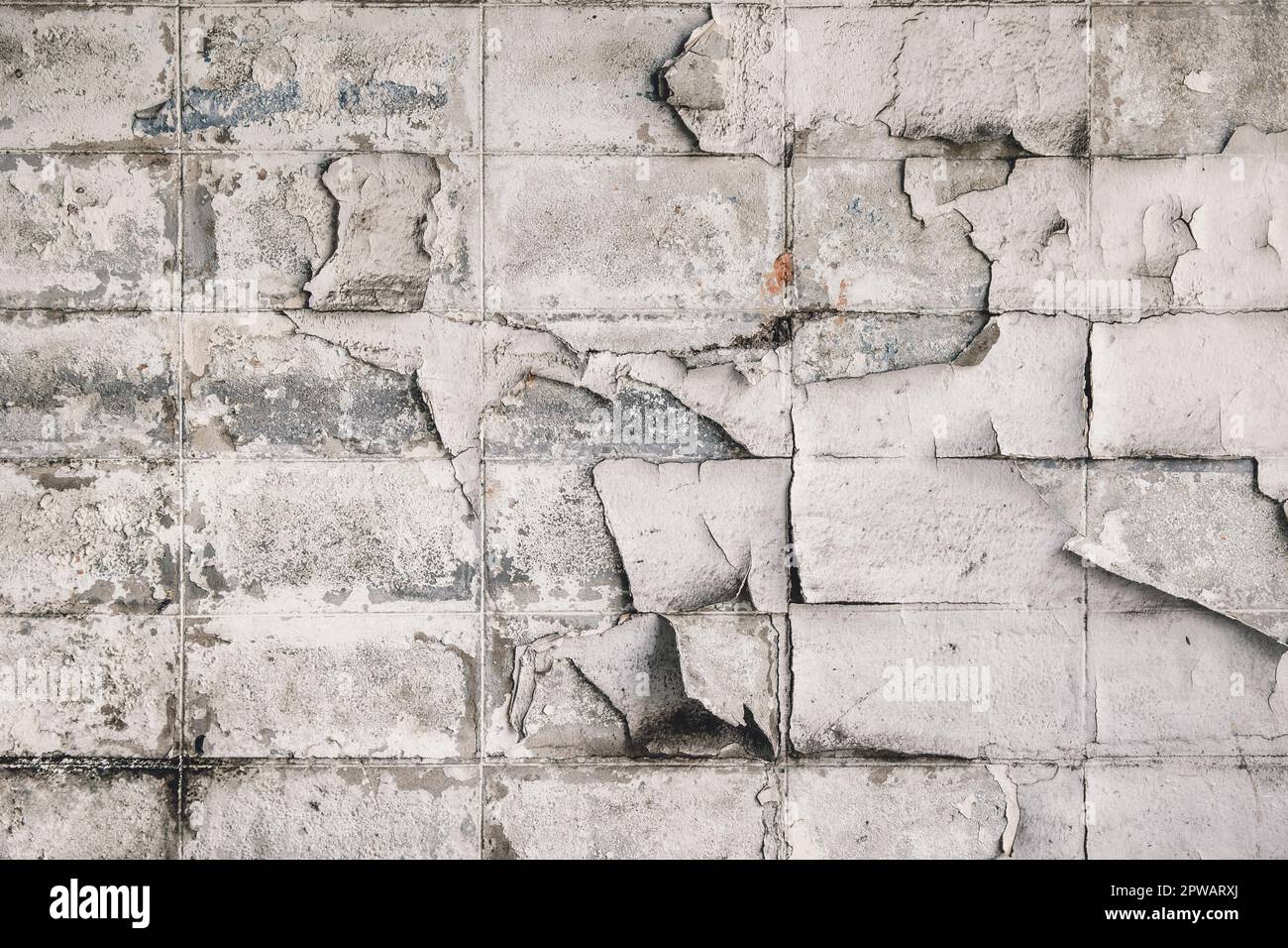 vieux grunge peinture peeling brique bloc sale poussiéreux vieilli mur motif de texture pour le fond de construction Banque D'Images