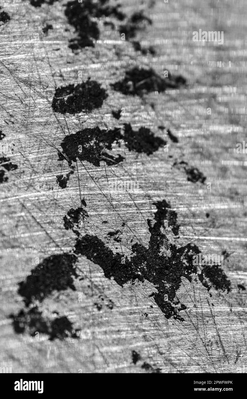 base brûlée d'une casserole en acier inoxydable Banque D'Images