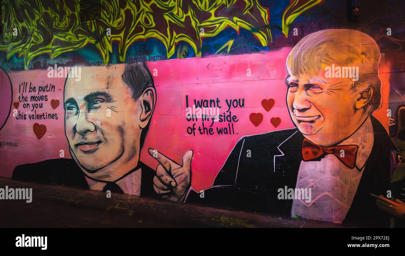 Trump et Poutine dans la célèbre peinture murale Melbourne Hosier Lane couverts de graffitis Banque D'Images
