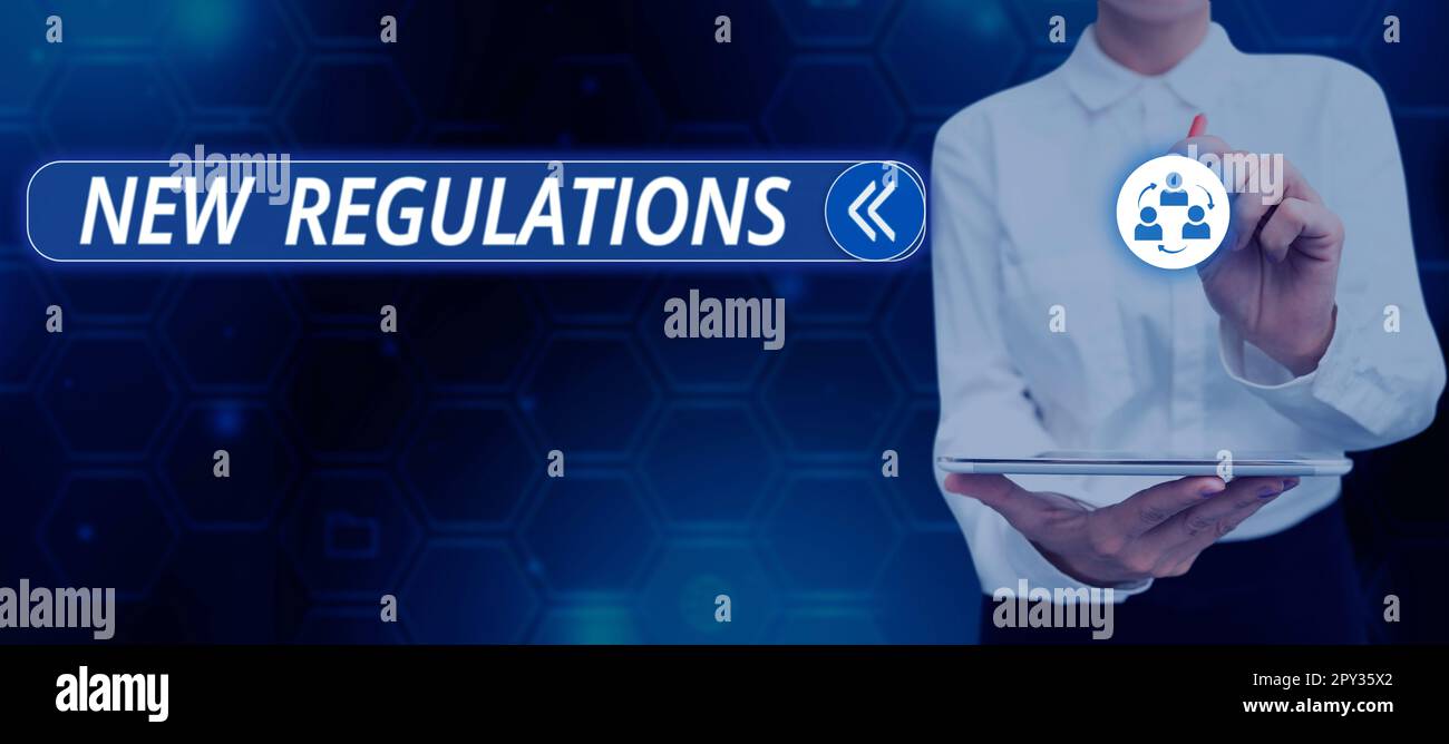 Panneau de texte montrant les nouveaux règlements, photo conceptuelle réglementation contrôlant l'activité habituellement utilisée par les règles. Banque D'Images