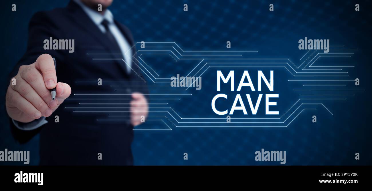 Écriture affichant le texte Man Cave. Mot écrit sur une pièce, un espace ou une zone d'un logement réservé à un homme Banque D'Images