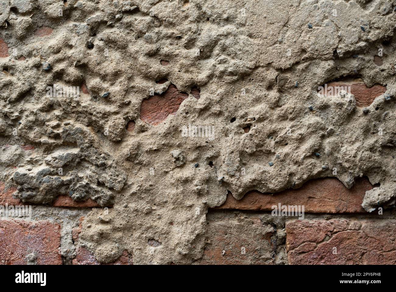 Vieux grunge mur fissuré fond texturé, Cement mur fond extérieur. Banque D'Images