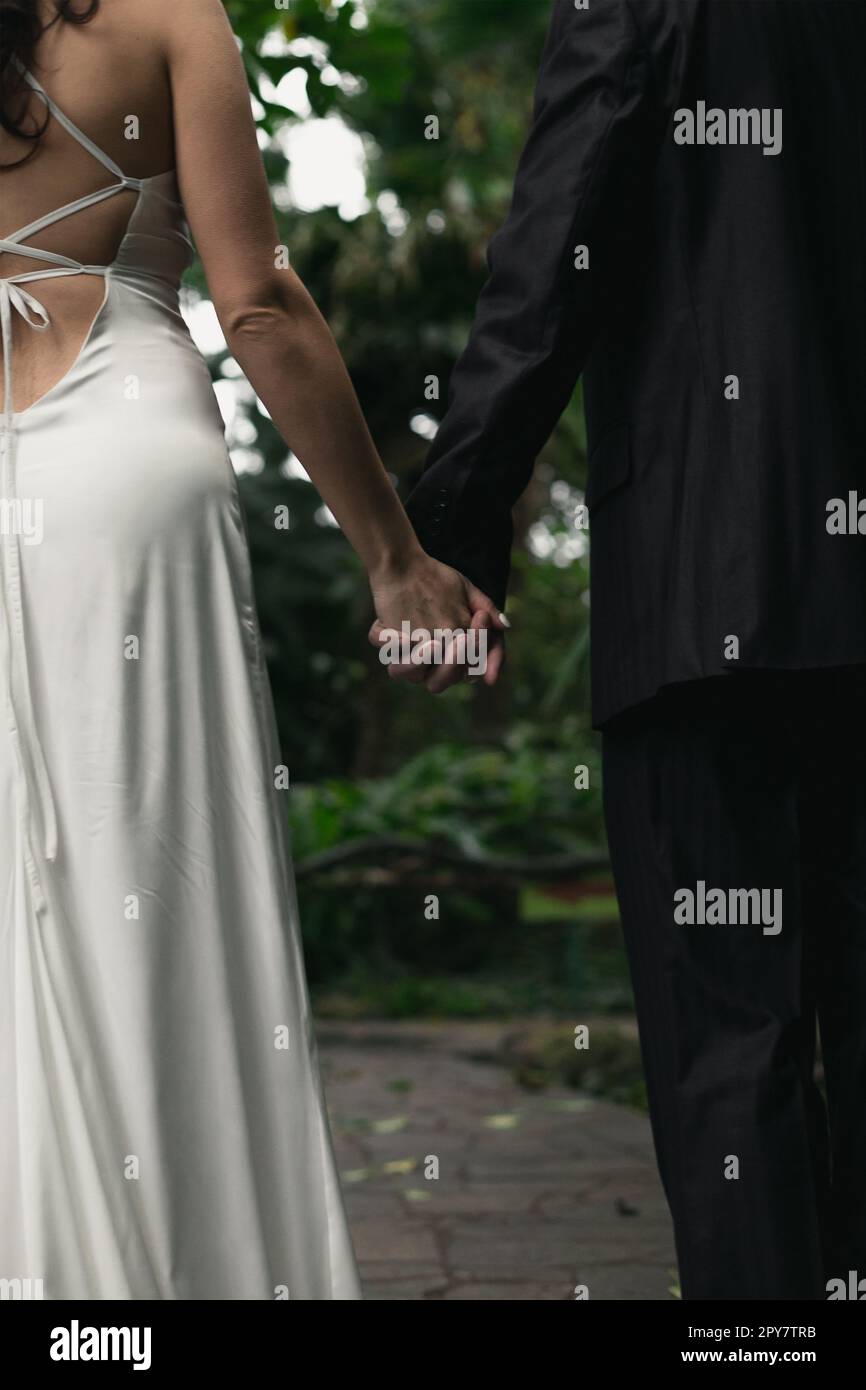 Gros plan newlyweds tenir les mains photo concept Banque D'Images