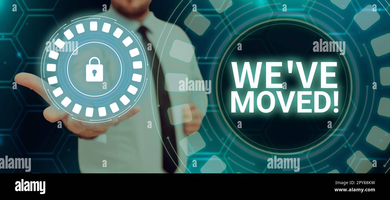 Signe d'écriture manuelle nous avons déplacé. Idée d'affaires de vivre à partir d'un autre endroit même ou pays différent Banque D'Images