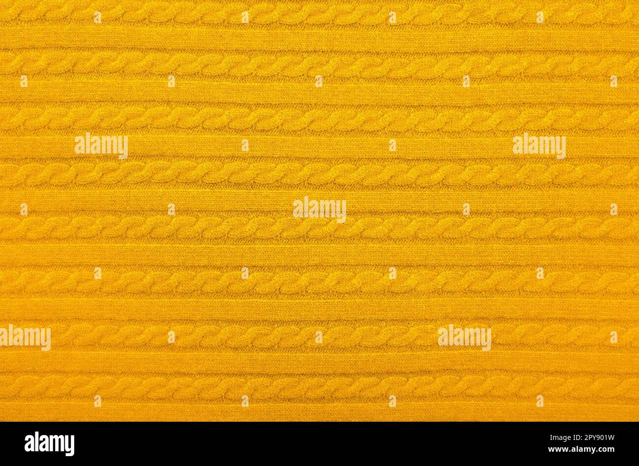 Texture d'arrière-plan de laine tricotée jaune Banque D'Images