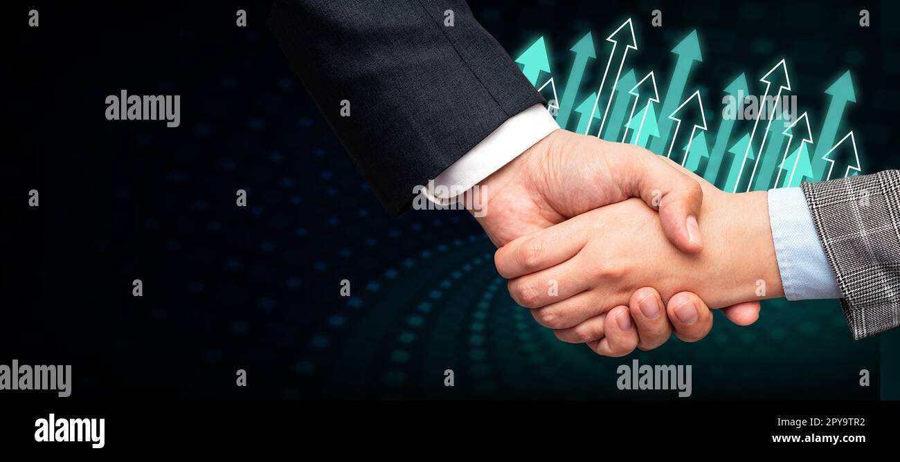 Poignée de main présentant des idées de plan innovantes symbolisant le succès du travail d'équipe accompli. Les paumes de bienvenue affichent un effort combiné pour accomplir des stratégies de projet. Banque D'Images