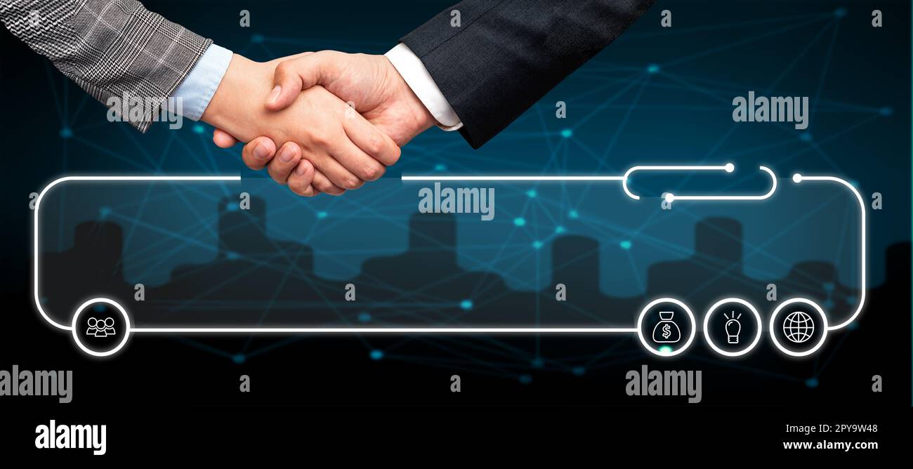 Poignée de main présentant des idées de plan innovantes symbolisant le succès du travail d'équipe accompli. Les paumes de bienvenue affichent un effort combiné pour accomplir des stratégies de projet. Banque D'Images