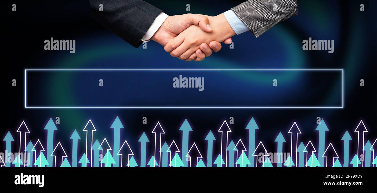 Poignée de main présentant des idées de plan innovantes symbolisant le succès du travail d'équipe accompli. Les paumes de bienvenue affichent un effort combiné pour accomplir des stratégies de projet. Banque D'Images