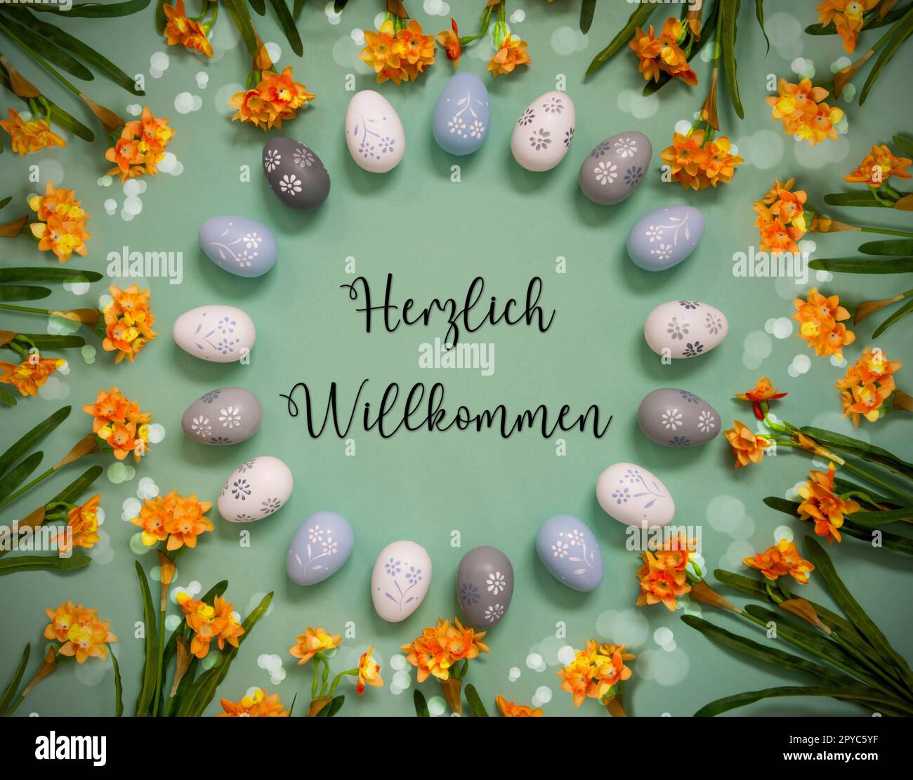 Décoration d'oeuf de Pâques, fleurs de printemps, texte Willkommen signifie Bienvenue Banque D'Images