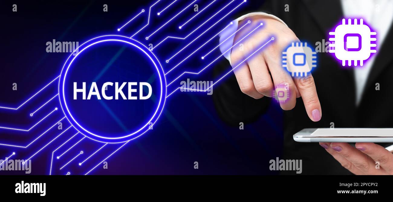 Affiche manuscrite piratée. Mot écrit sur obtenir un accès non autorisé aux données dans le système ou l'ordinateur cybercrime Banque D'Images