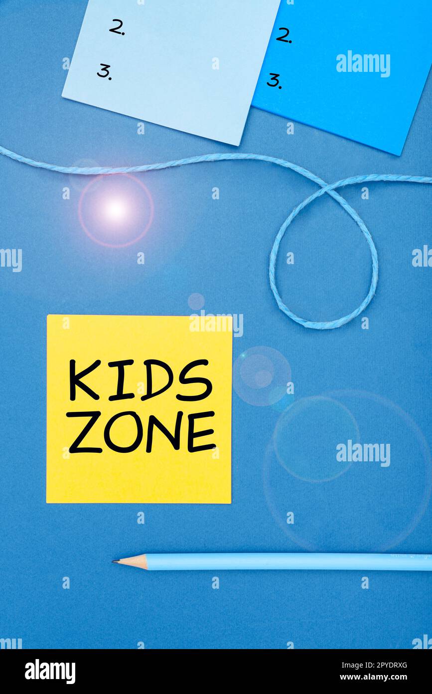 Texte montrant inspiration Kids zone. Mot pour une zone ou une région conçue pour permettre aux enfants de jouer et de profiter Banque D'Images
