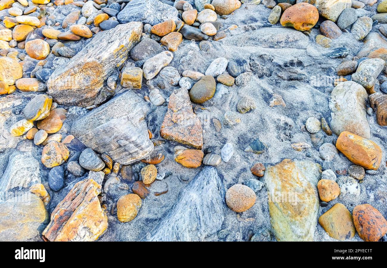 Belle plage de texture de rocher de pierre de falaise rocheuse au Mexique. Banque D'Images
