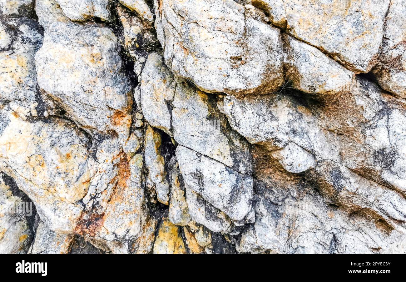 Belle plage de texture de rocher de pierre de falaise rocheuse au Mexique. Banque D'Images