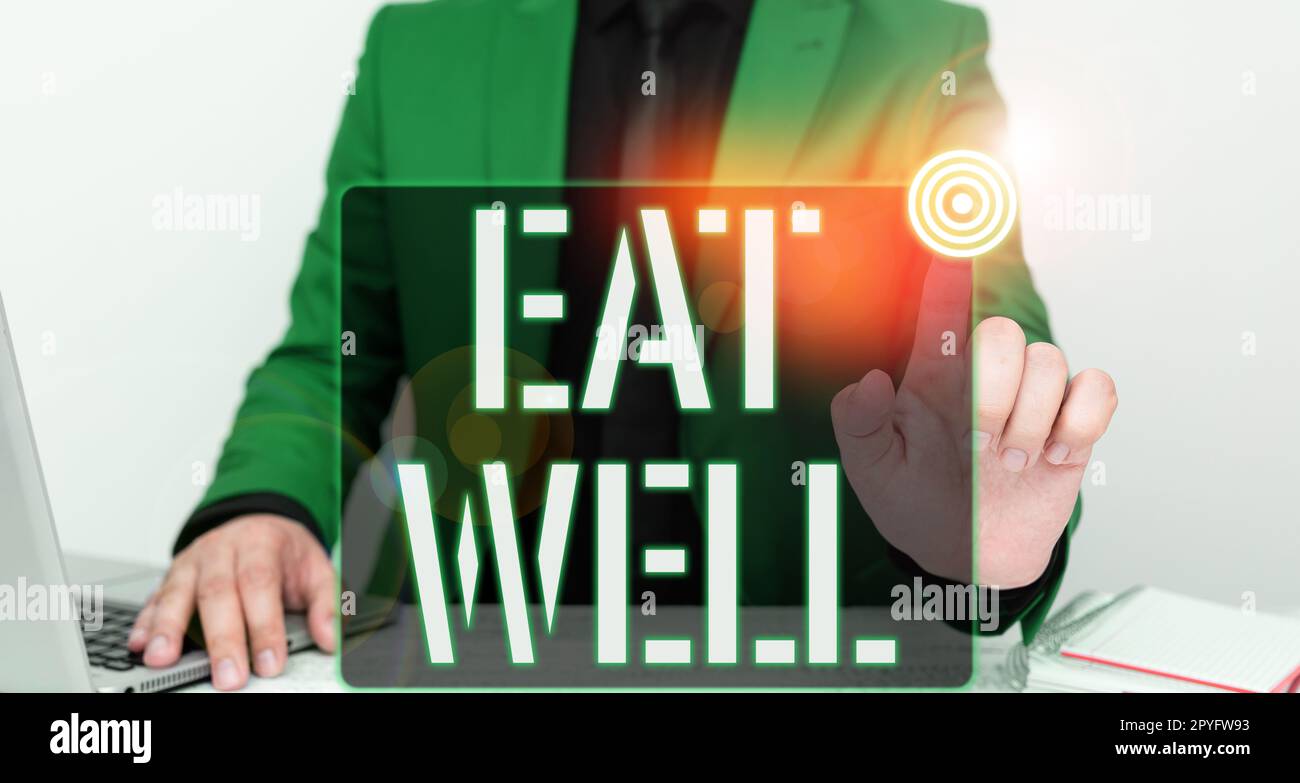 Affiche indiquant « mangez bien ». Aperçu de l'entreprise pratique consistant à ne manger que des aliments entiers et non transformés Banque D'Images