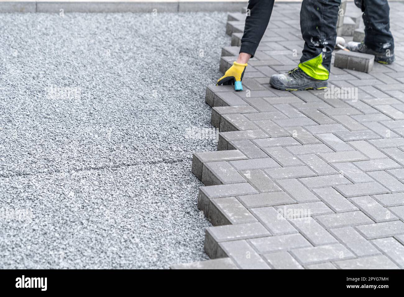 nouveau trottoir en blocs de pavage emboîtés en béton Banque D'Images