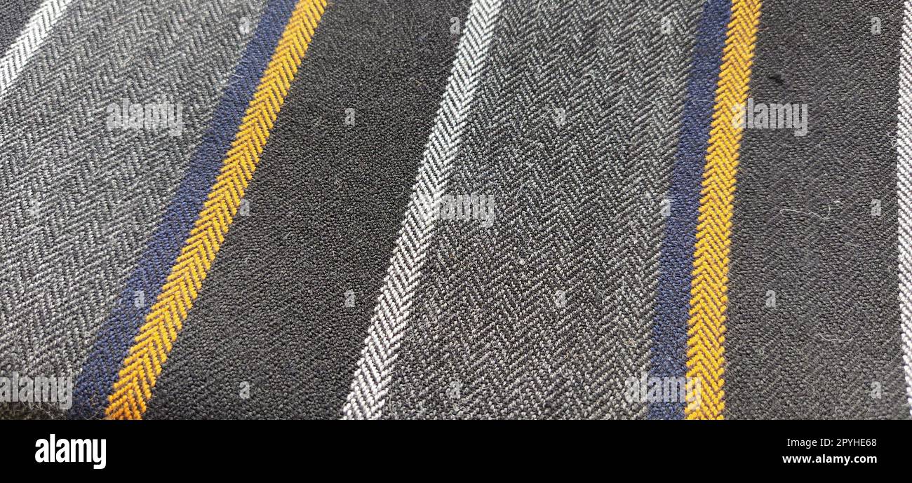 Tissu léger avec des rayures orange et bleu foncé. Décoration intérieure. Habiller les tissus dans un style décontracté. Matériau dense pour rideaux d'intérieur et finition de meubles Banque D'Images