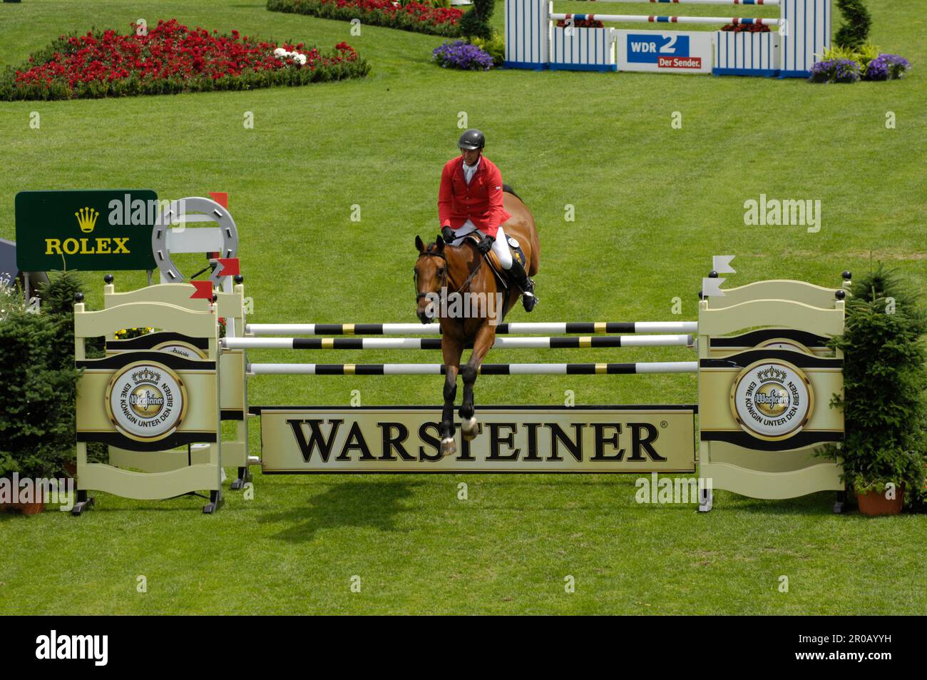 Franke Sloothaak Aktion auf Legurio.Springreiten Warsteiner Preis von Europa 2.7.2008 Banque D'Images