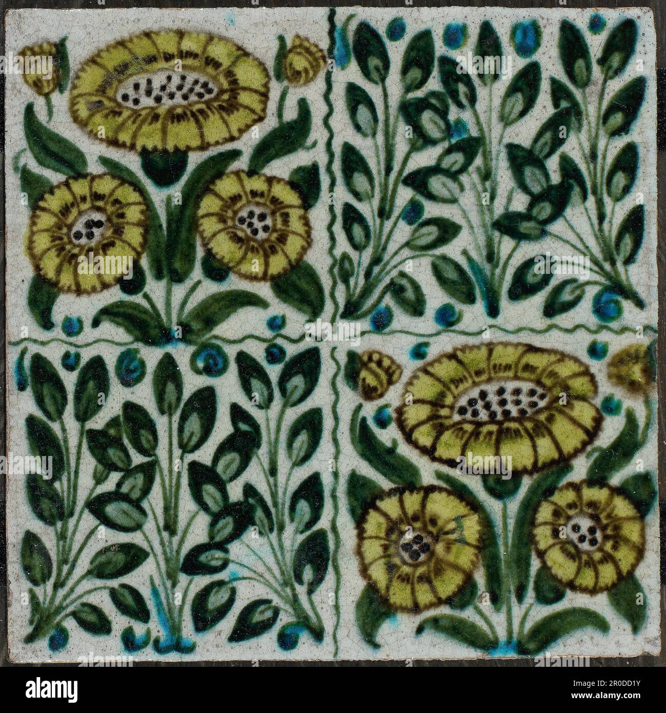 Carreau de mur - Collection William de Morgan, 1873-1888. Concepteur : William de Morgan. Fabricant: Architectural Pottery Co. Transfert décoré ou peint avec le motif « Bedford Park Daisy » divisé en 4 carrés. Banque D'Images