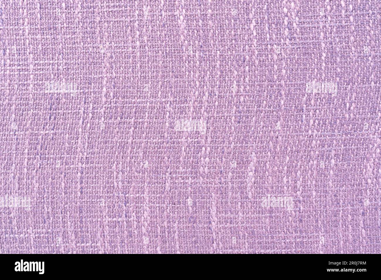 Fond violet clair d'un matériau textile. Tissu à texture naturelle. Banque D'Images