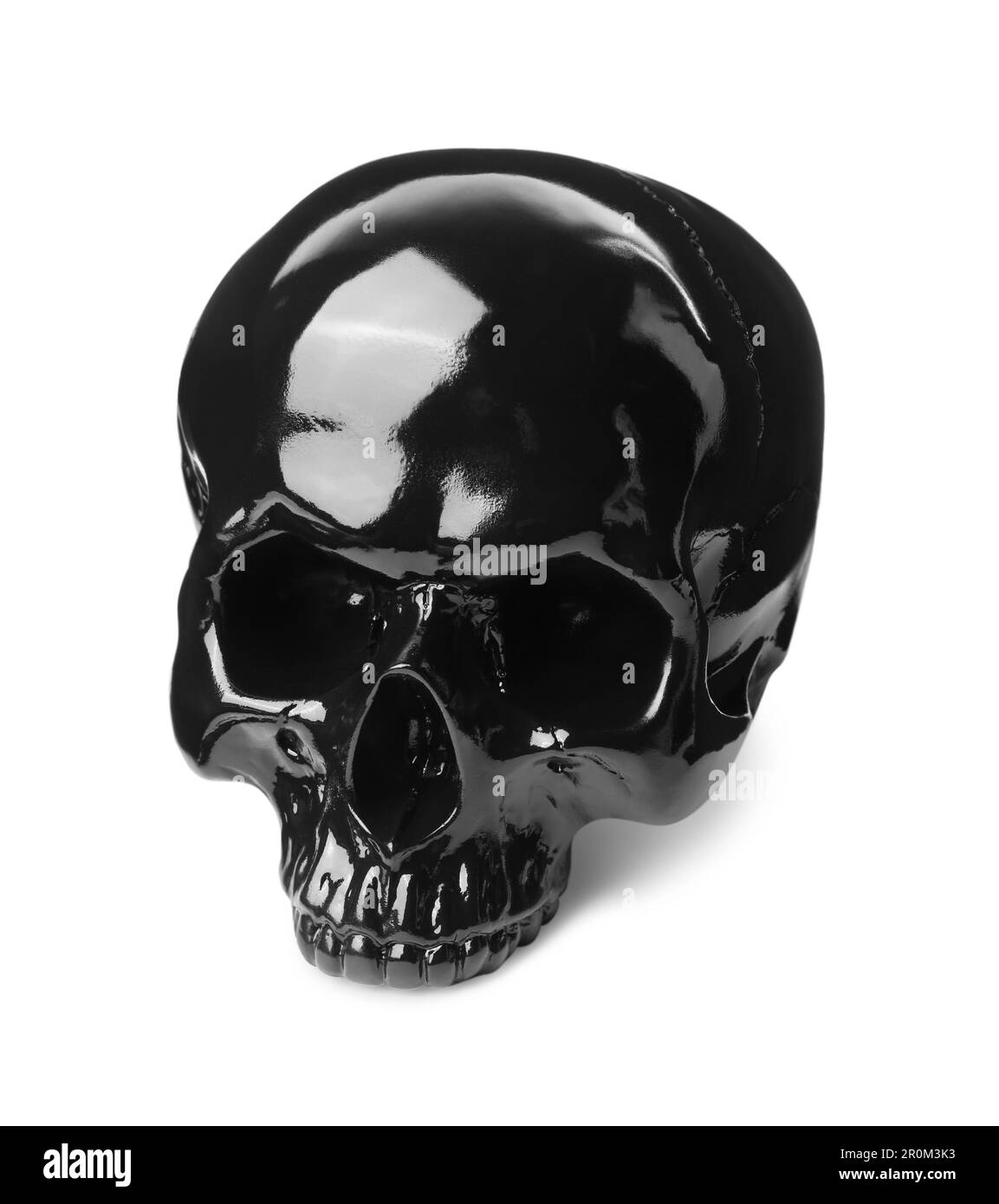Crâne humain brillant noir isolé sur blanc Banque D'Images