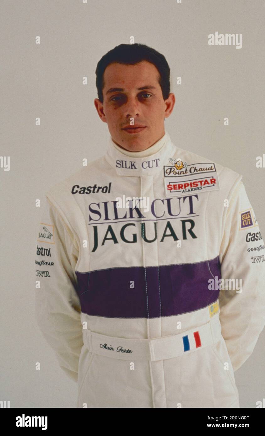 Pilote Alain Ferte de l'équipe Jaguar Silk Cut, 1990 Banque D'Images