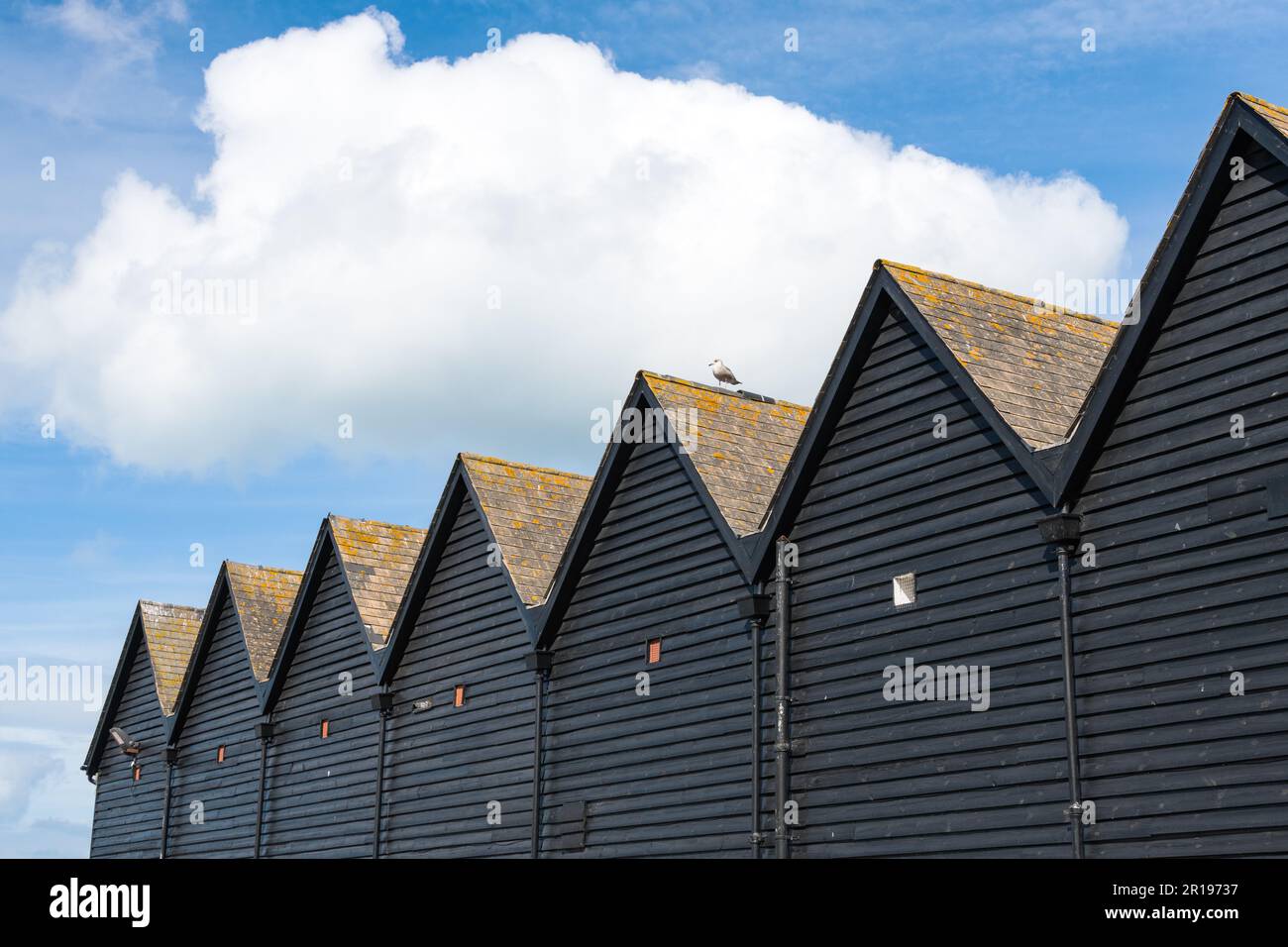 Cabanes de pêcheurs traditionnelles dans le port de Whitstable, Kent, Angleterre Banque D'Images